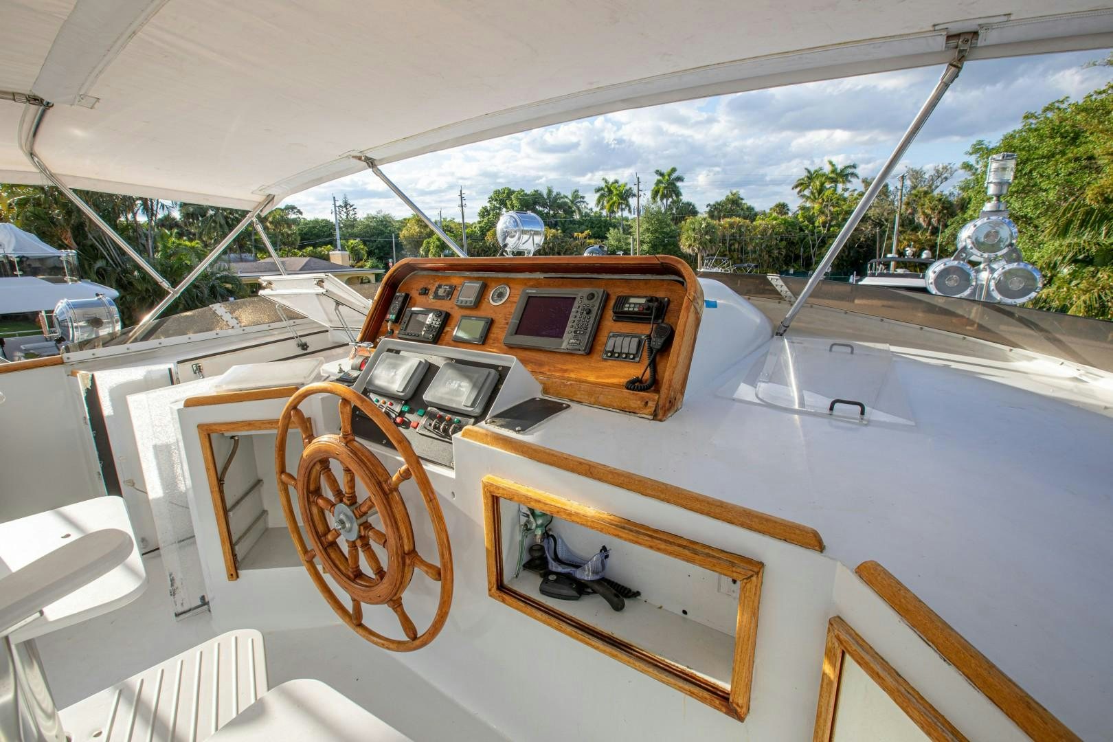 a wooden boat with a steering wheel aboard ZANTINO III Yacht for Sale
