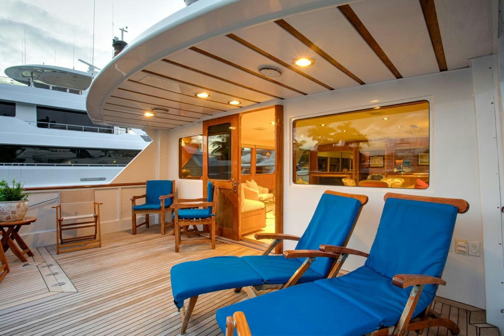 a room with chairs and tables aboard ZANTINO III Yacht for Sale