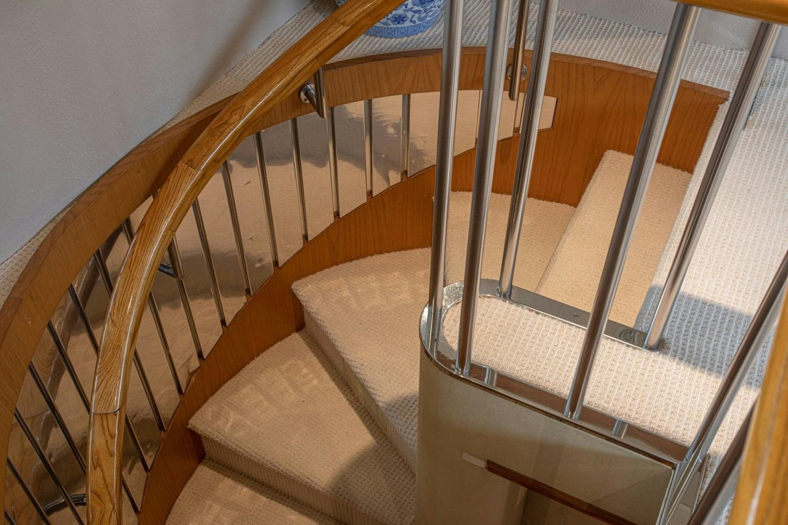 a staircase with wooden railings aboard ZANTINO III Yacht for Sale
