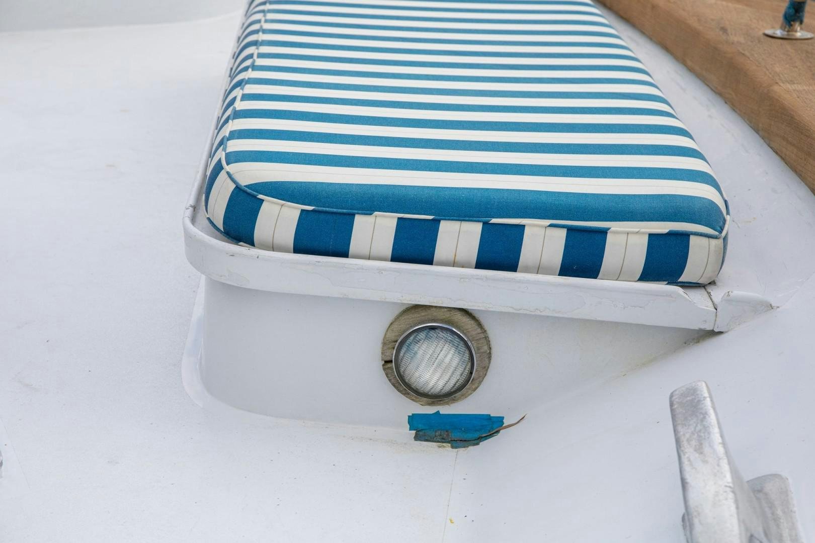 a stack of blue and white striped boxes aboard ZANTINO III Yacht for Sale