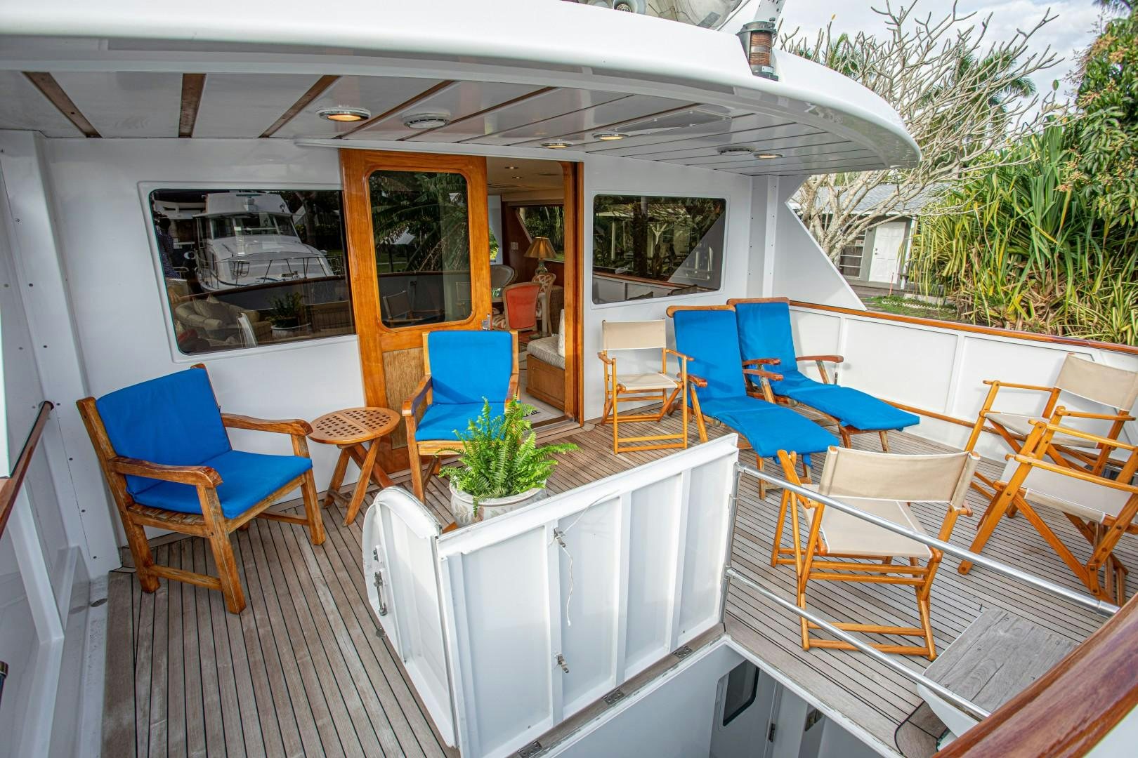 a room with chairs and tables aboard ZANTINO III Yacht for Sale