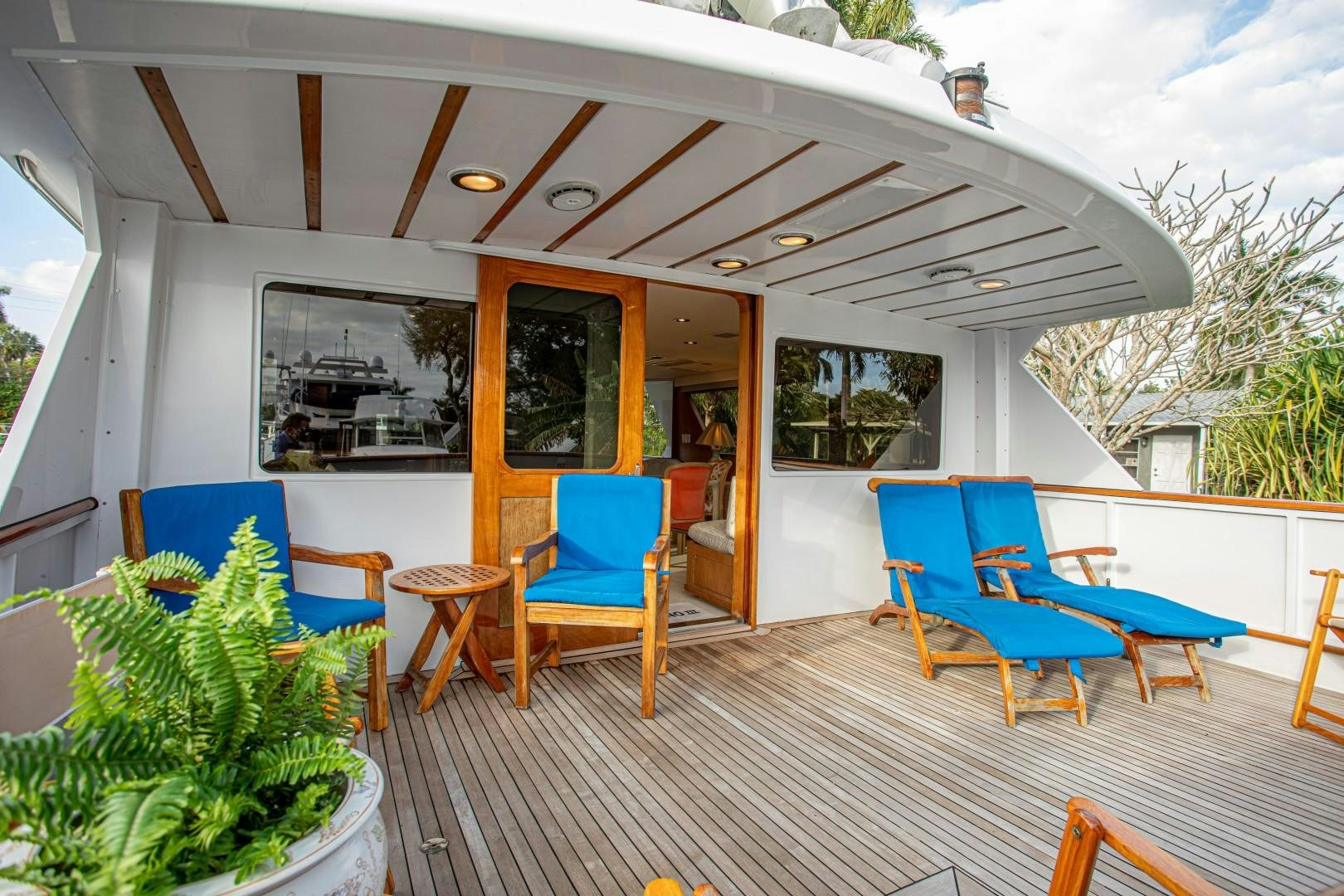 a large house with a pool table and chairs aboard ZANTINO III Yacht for Sale