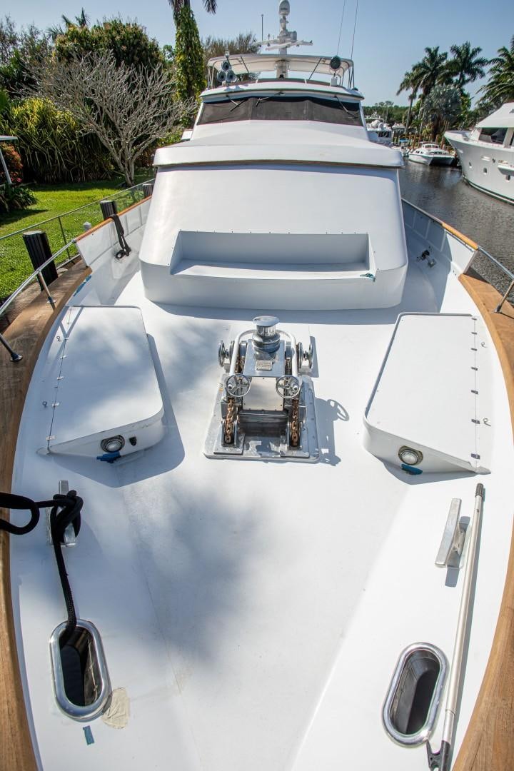 a white car with a small engine aboard ZANTINO III Yacht for Sale