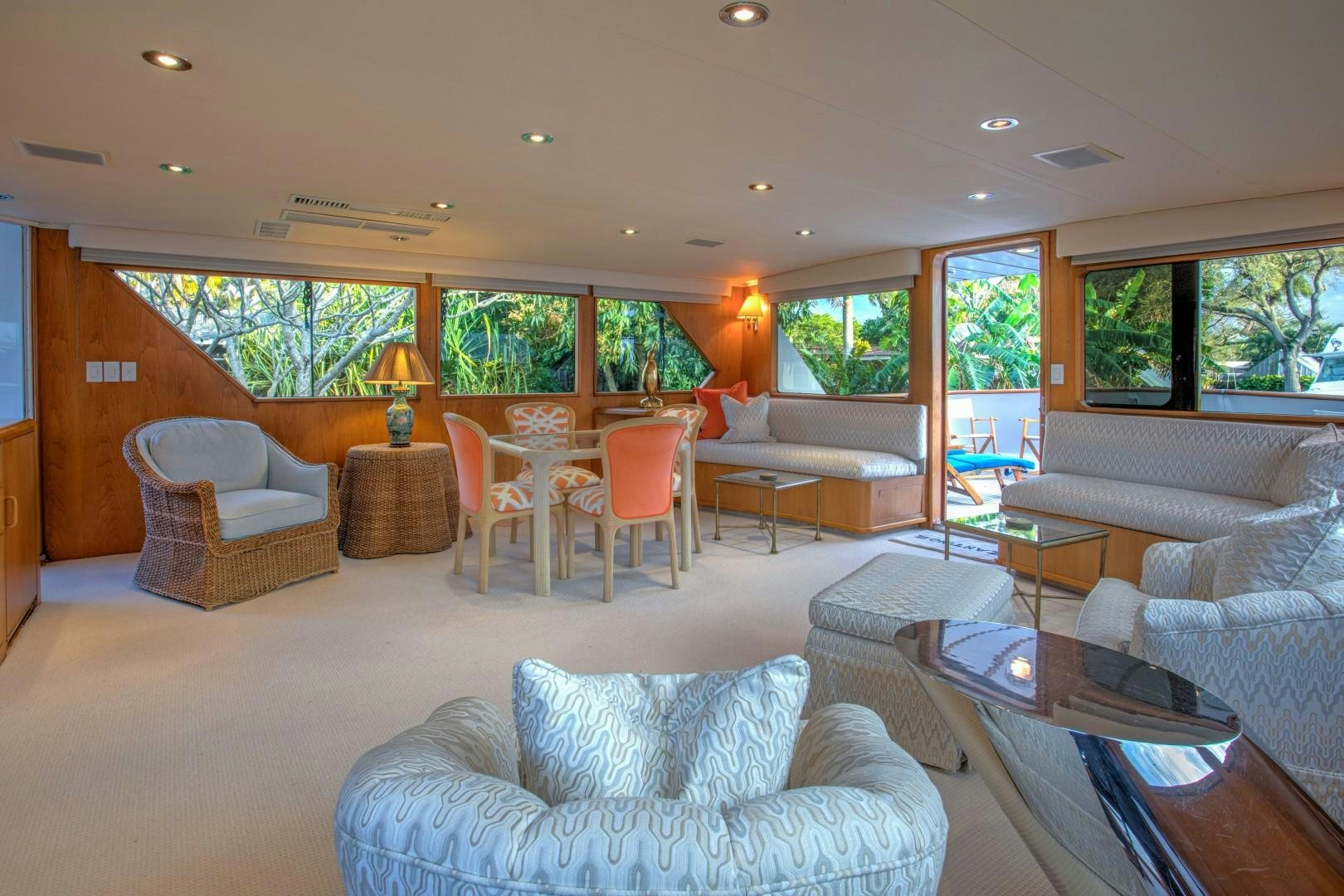 a living room with a couch and chairs aboard ZANTINO III Yacht for Sale