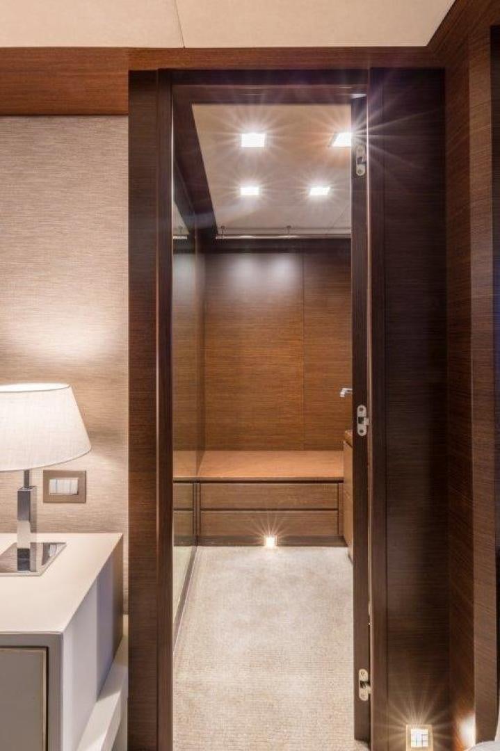 a room with a large glass door aboard AMANECER Yacht for Sale