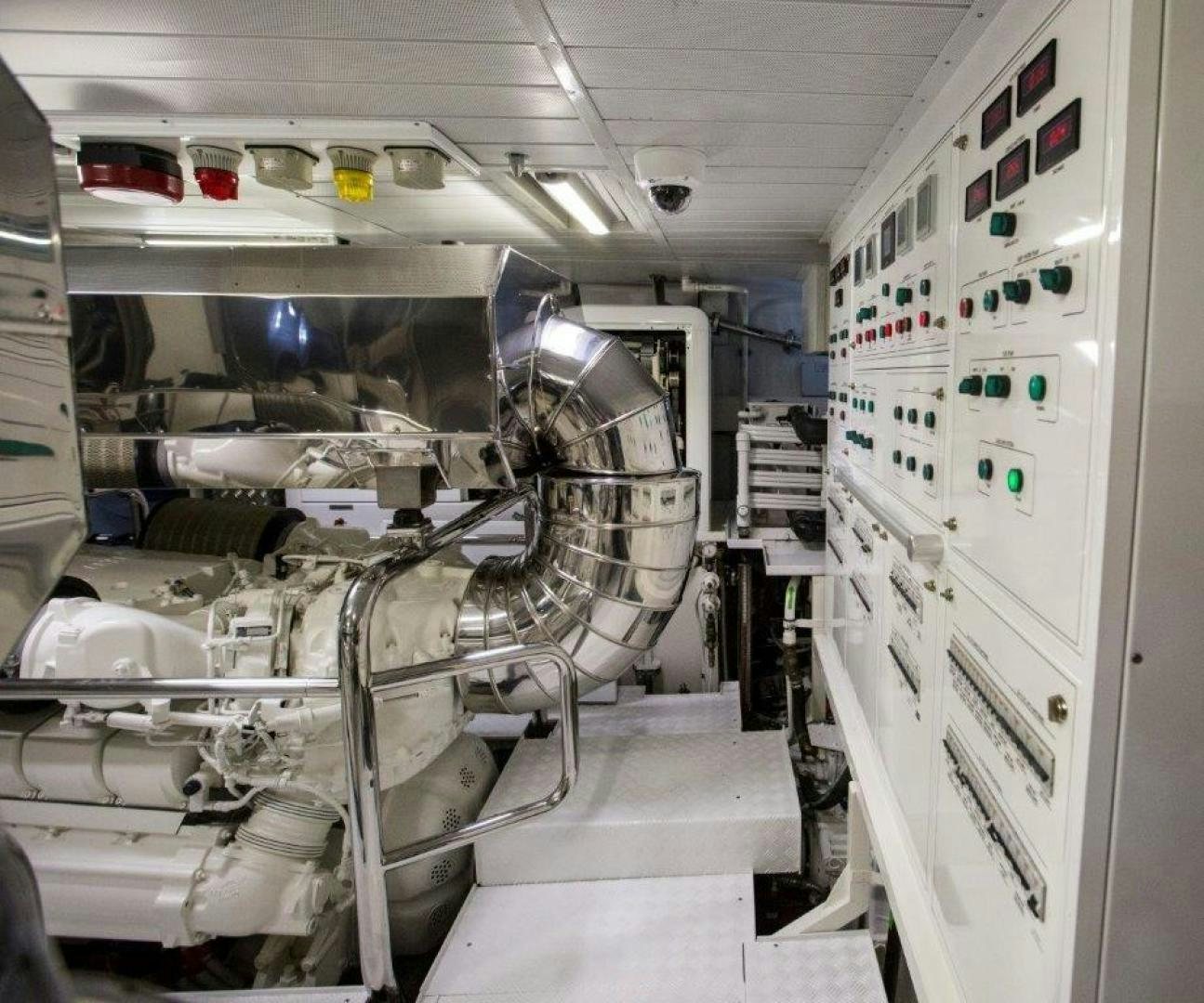 a room with several white machines aboard AMANECER Yacht for Sale