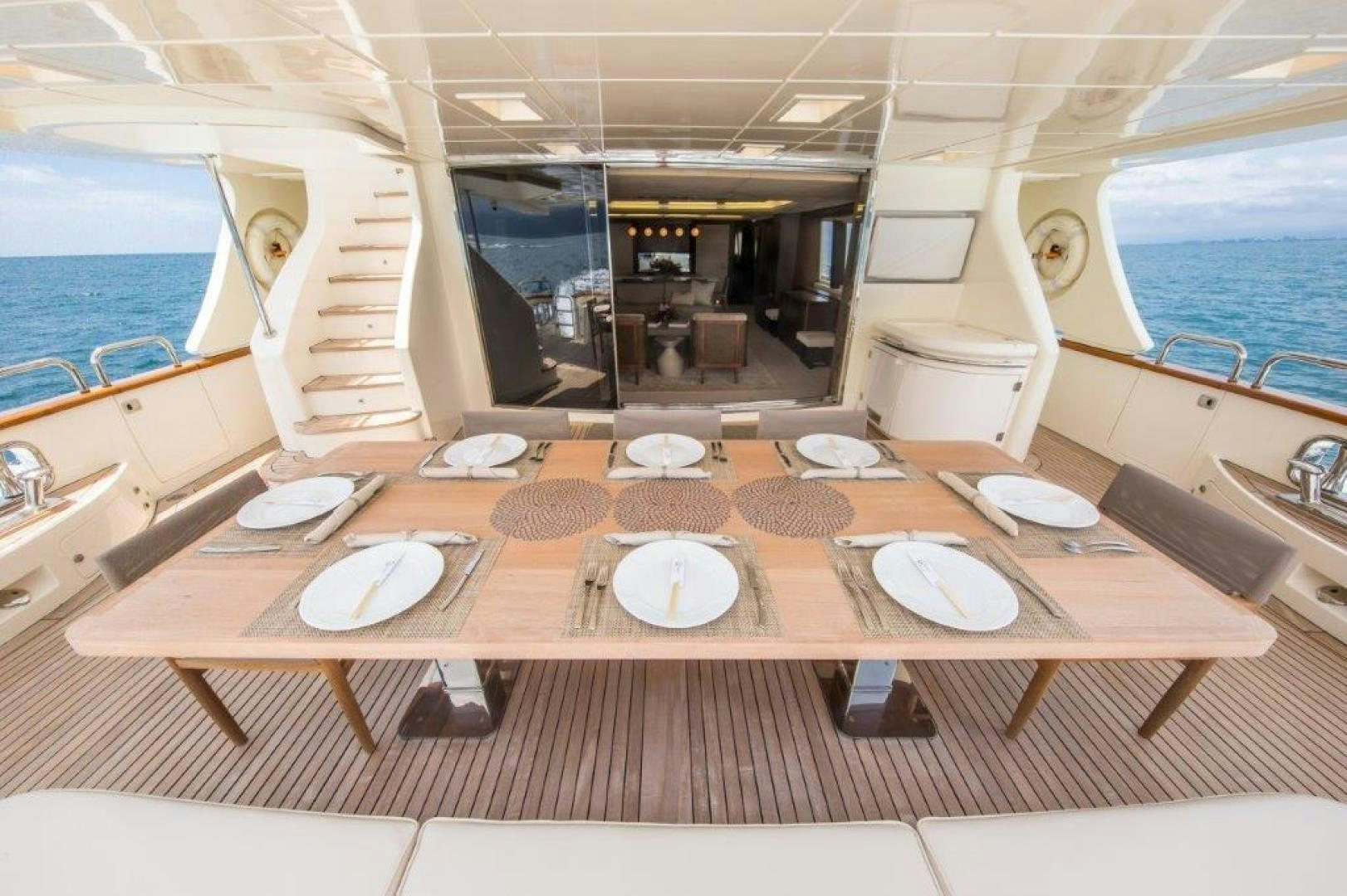 a dining table on a ship aboard AMANECER Yacht for Sale