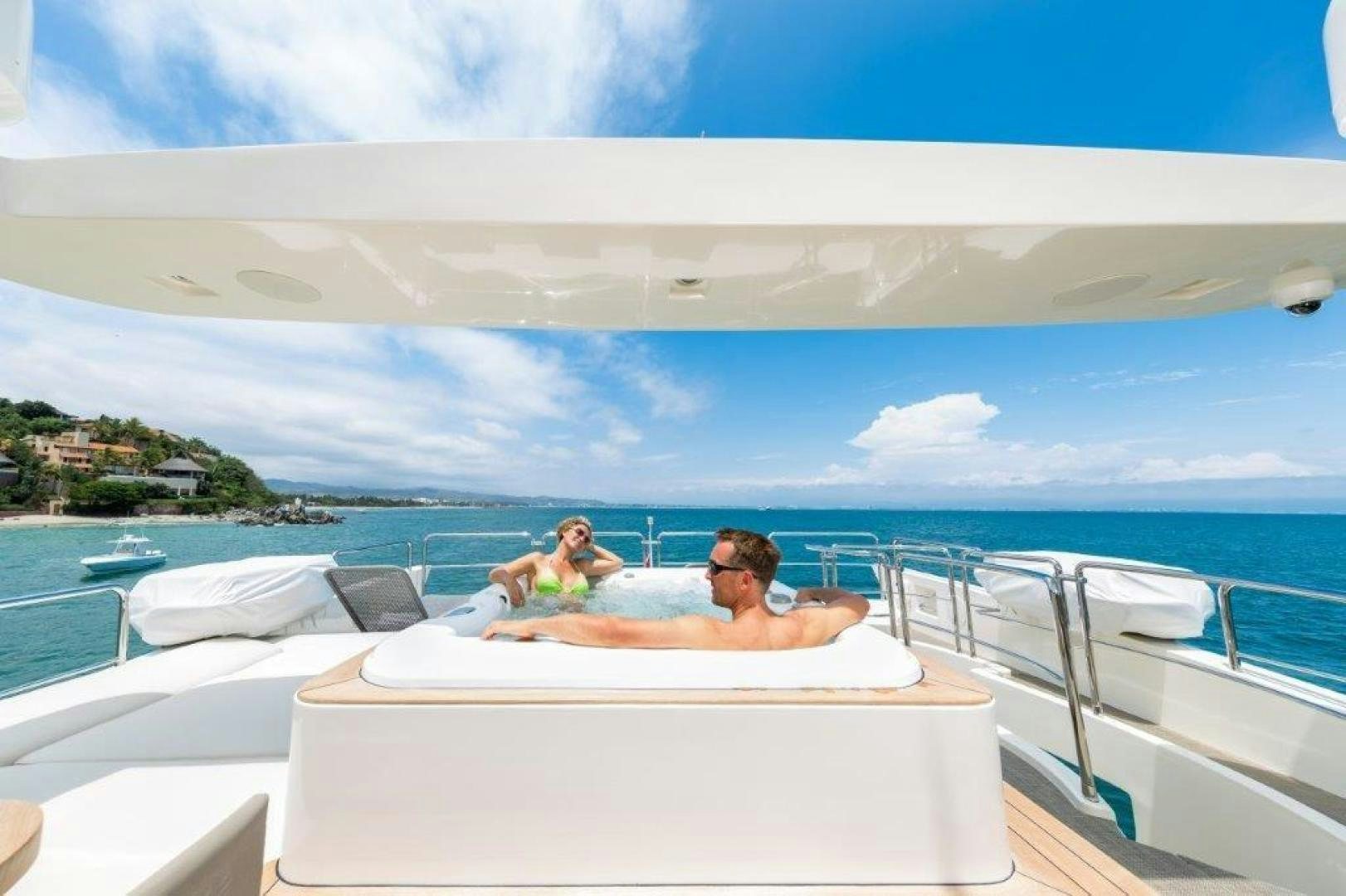 a group of people on a boat aboard AMANECER Yacht for Sale
