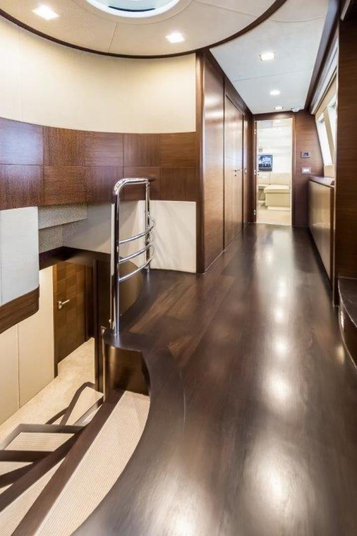 a hallway with a metal railing aboard AMANECER Yacht for Sale