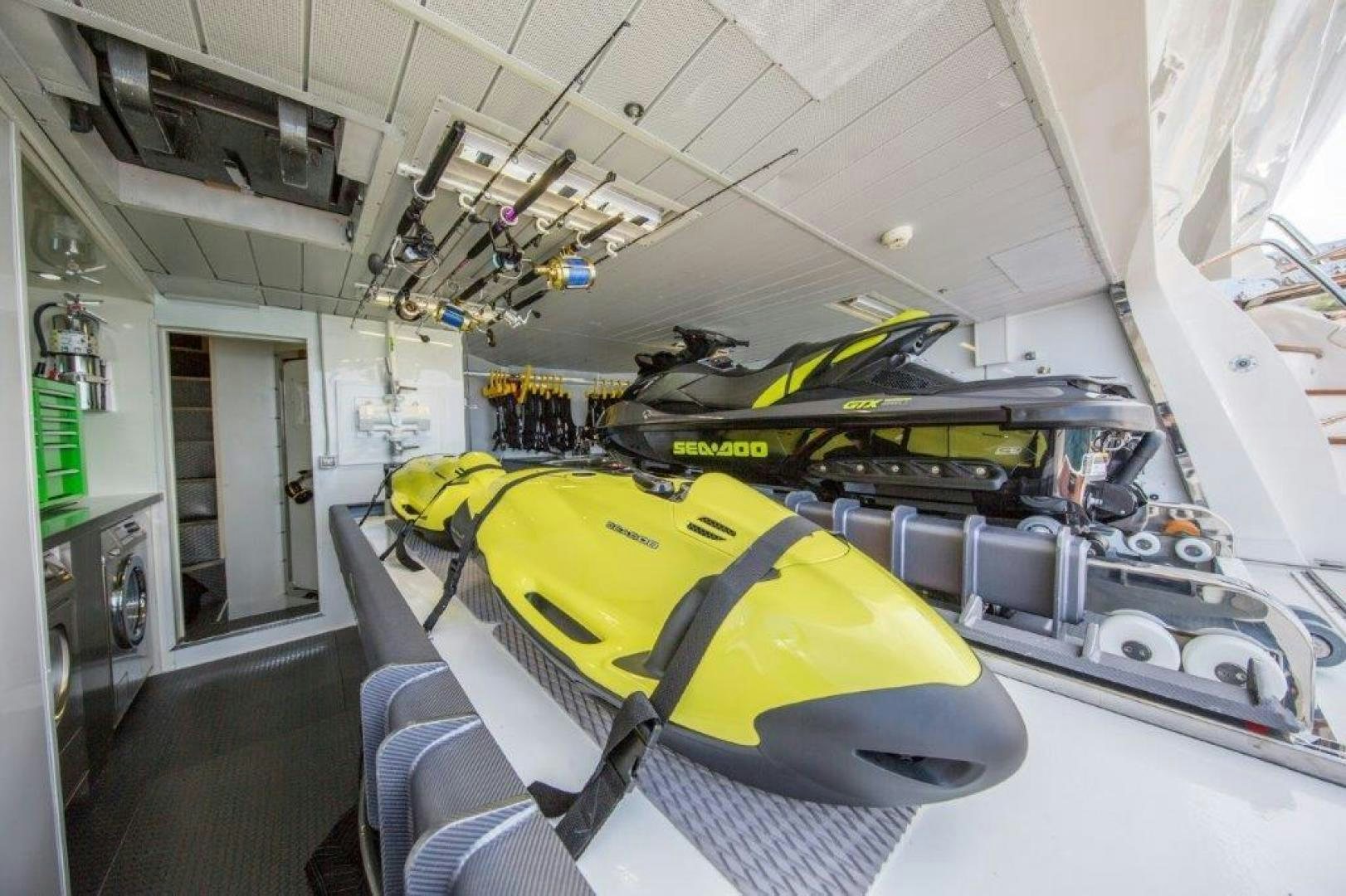a car in a garage aboard AMANECER Yacht for Sale