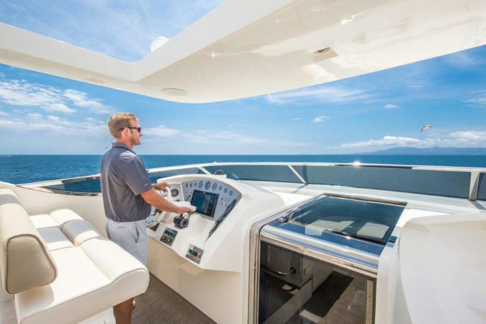 a man on a boat aboard AMANECER Yacht for Sale