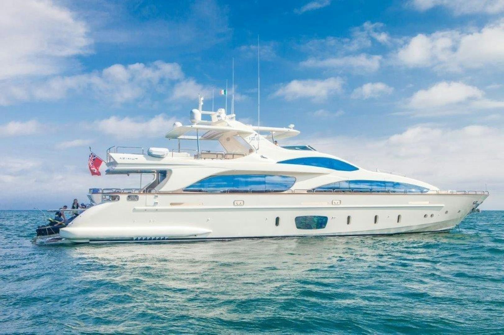 a white yacht in the water aboard AMANECER Yacht for Sale