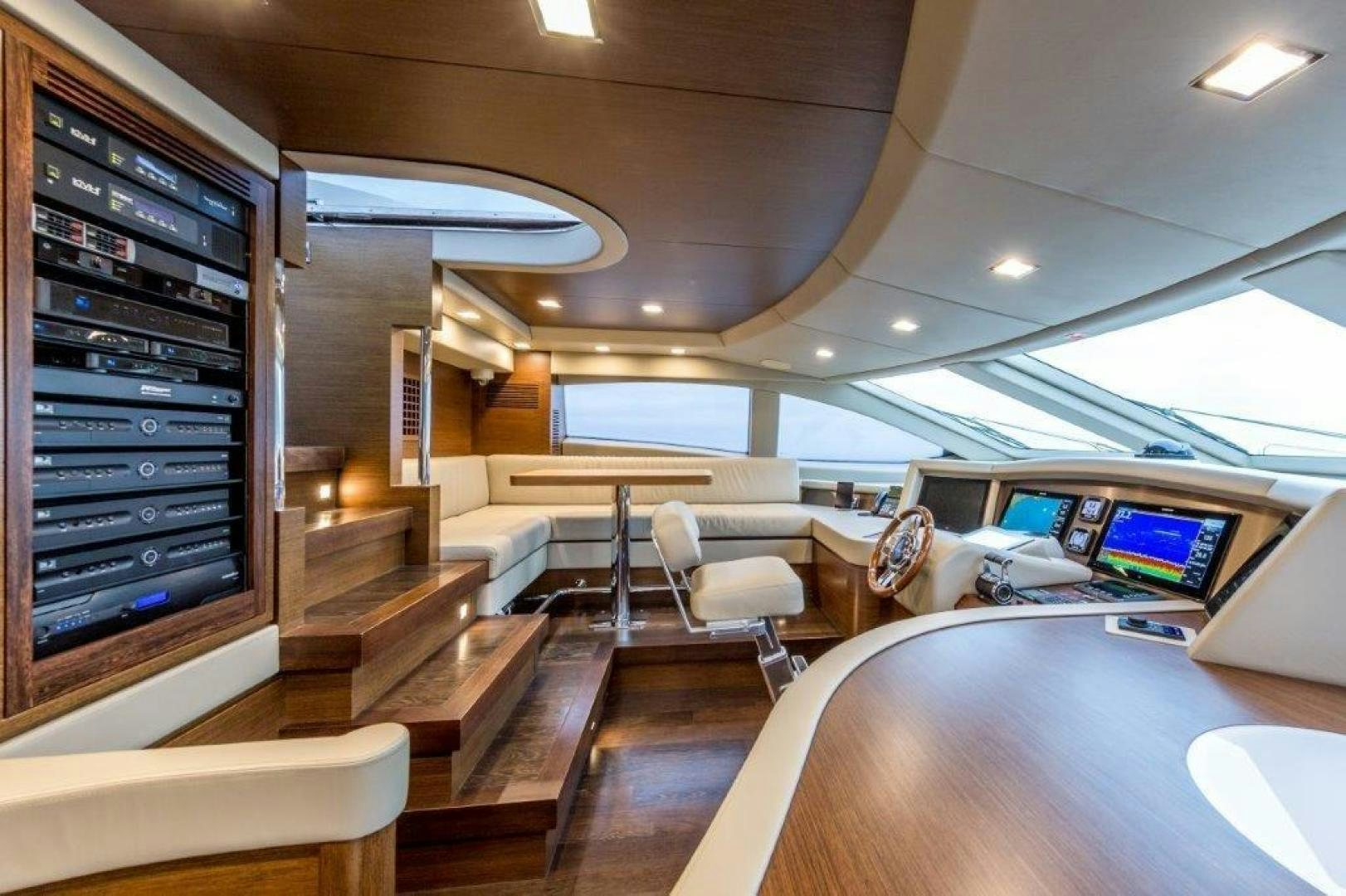 inside of a building with a desk and chairs aboard AMANECER Yacht for Sale