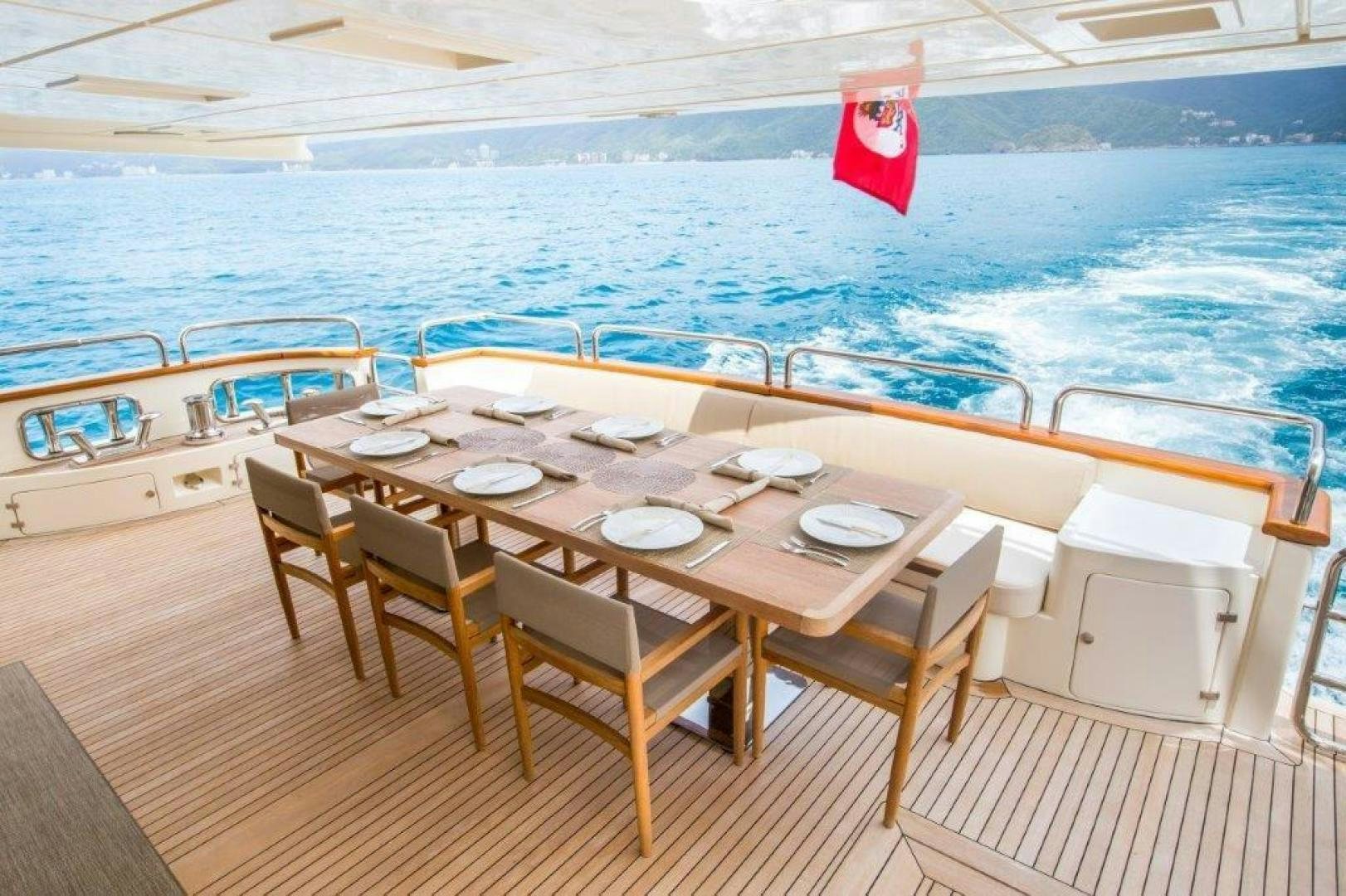 a table on a boat aboard AMANECER Yacht for Sale