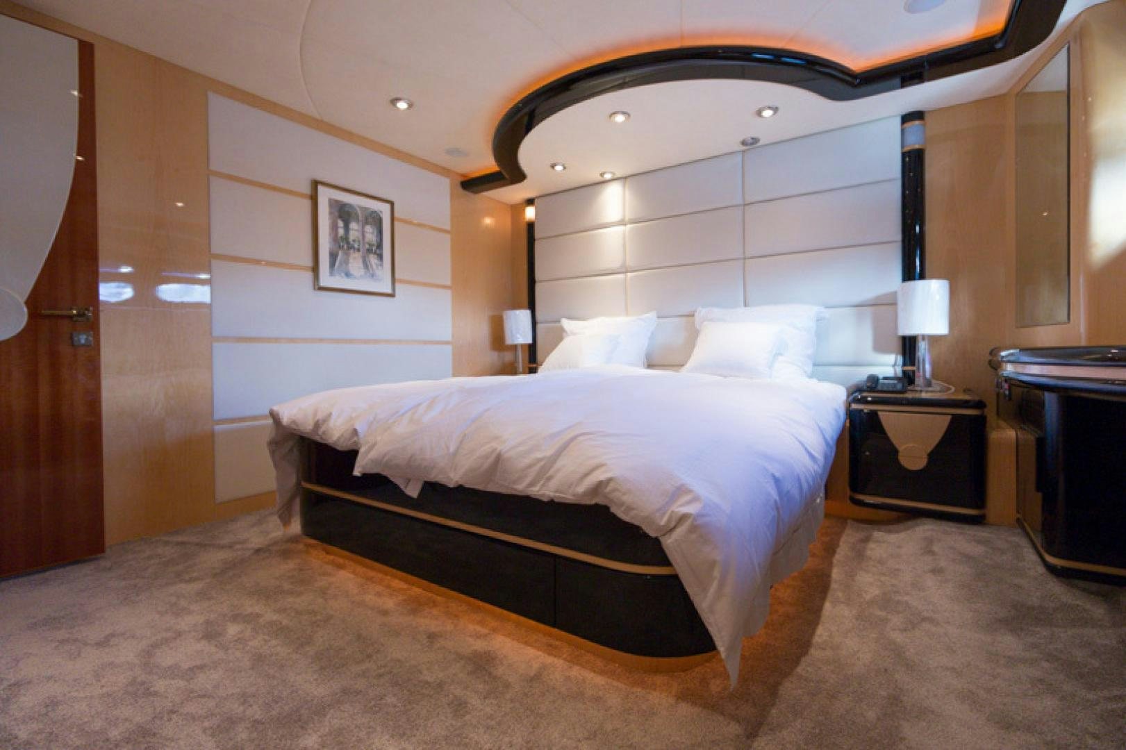 a bed in a room aboard MR. CAT Yacht for Sale