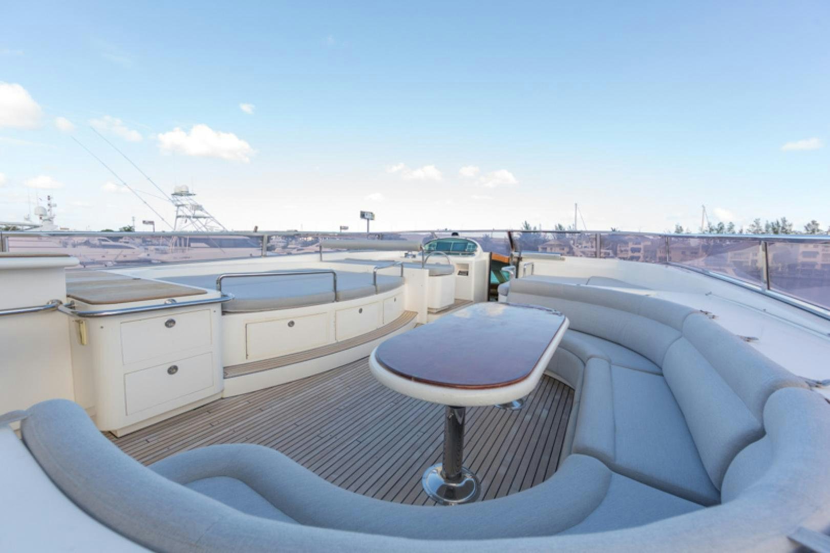 a table on a deck aboard MR. CAT Yacht for Sale