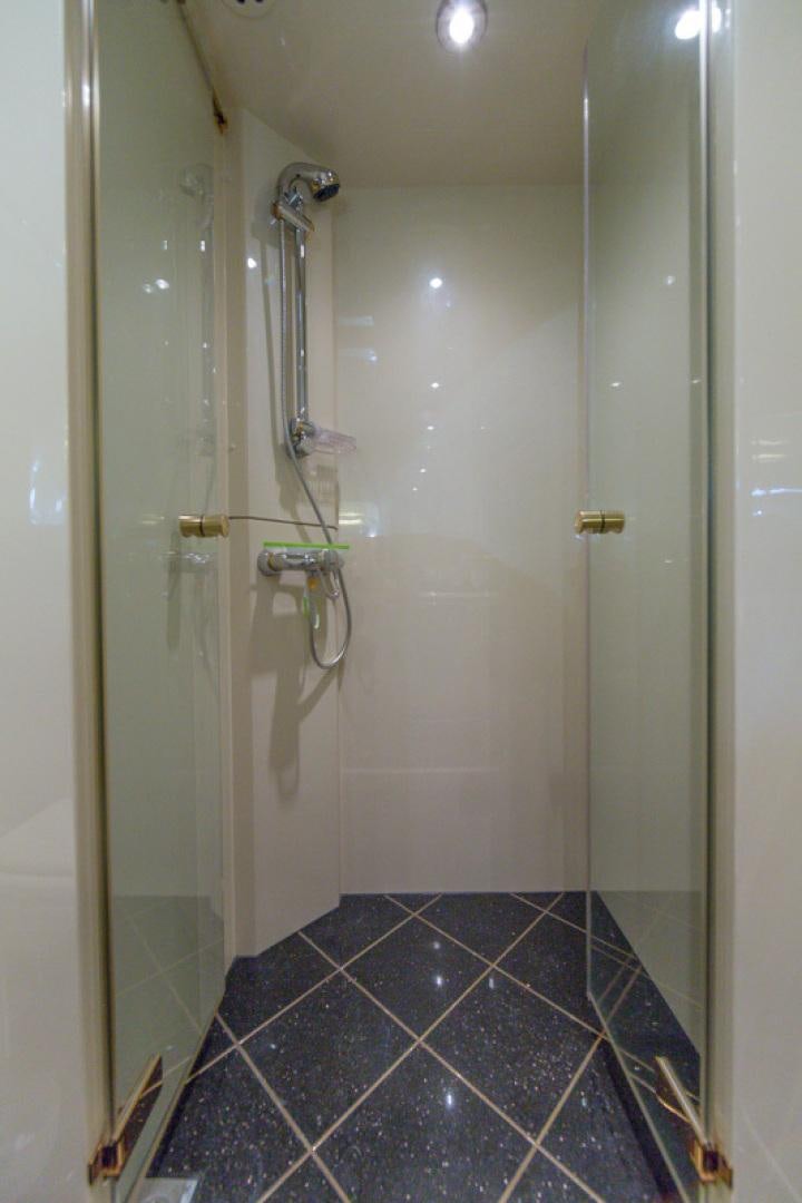 a shower with a glass door aboard MR. CAT Yacht for Sale