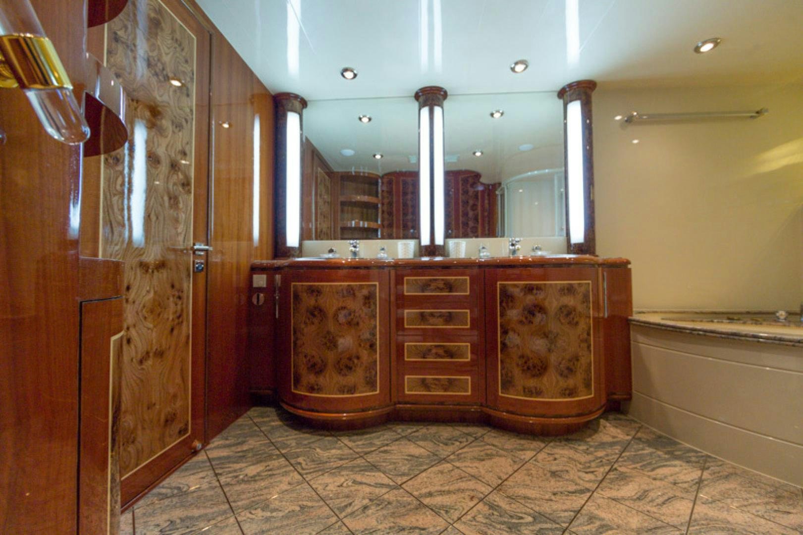 a bathroom with a cabinet and sinks aboard MR. CAT Yacht for Sale