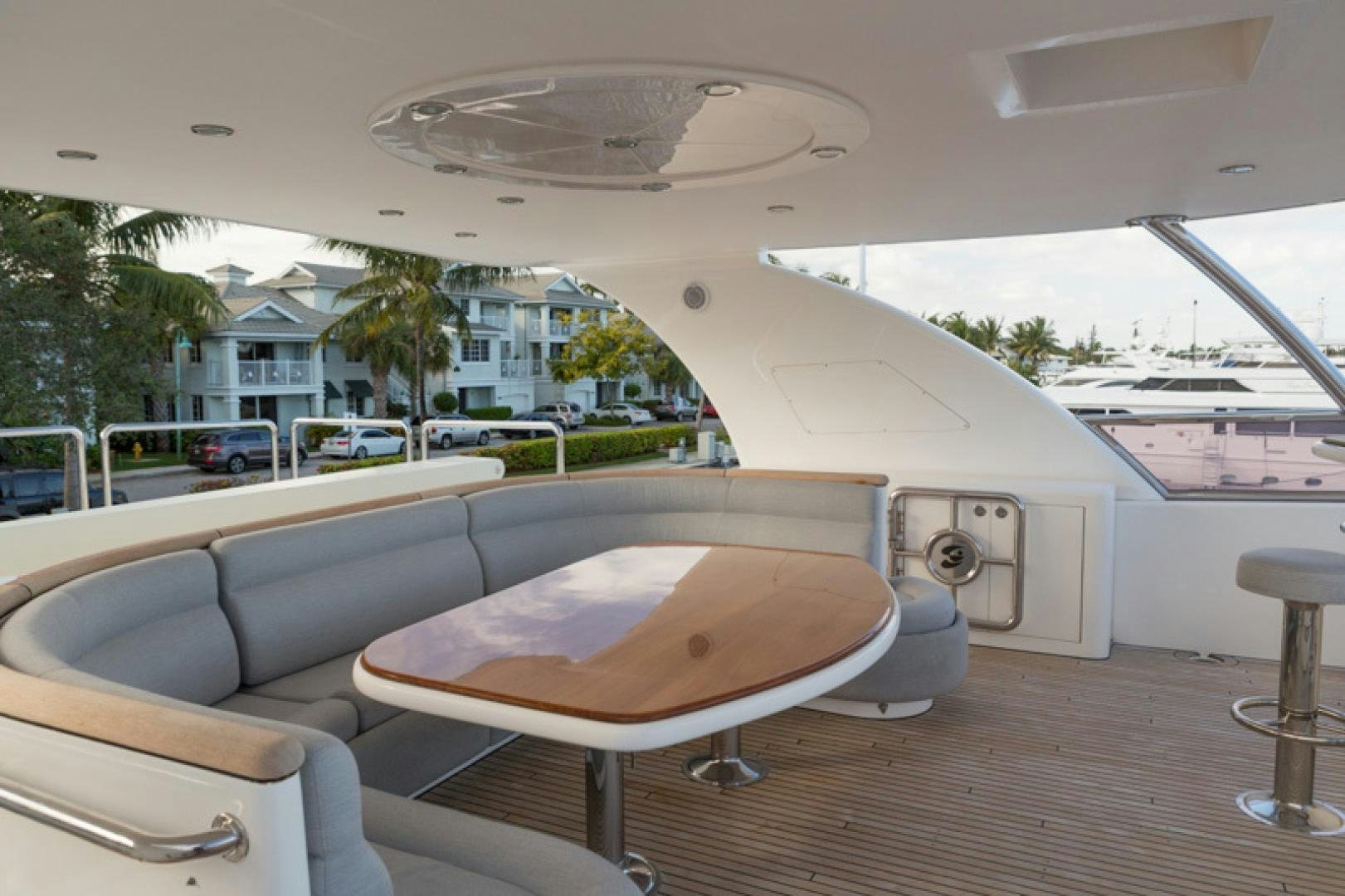 a room with a table and chairs aboard MR. CAT Yacht for Sale