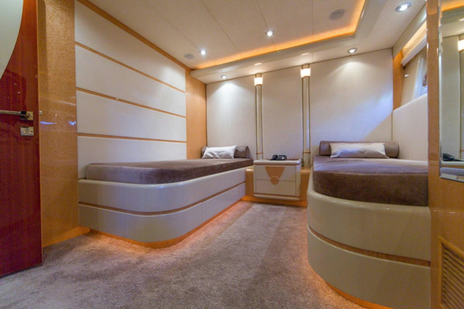 a room with a bed and a closet aboard MR. CAT Yacht for Sale