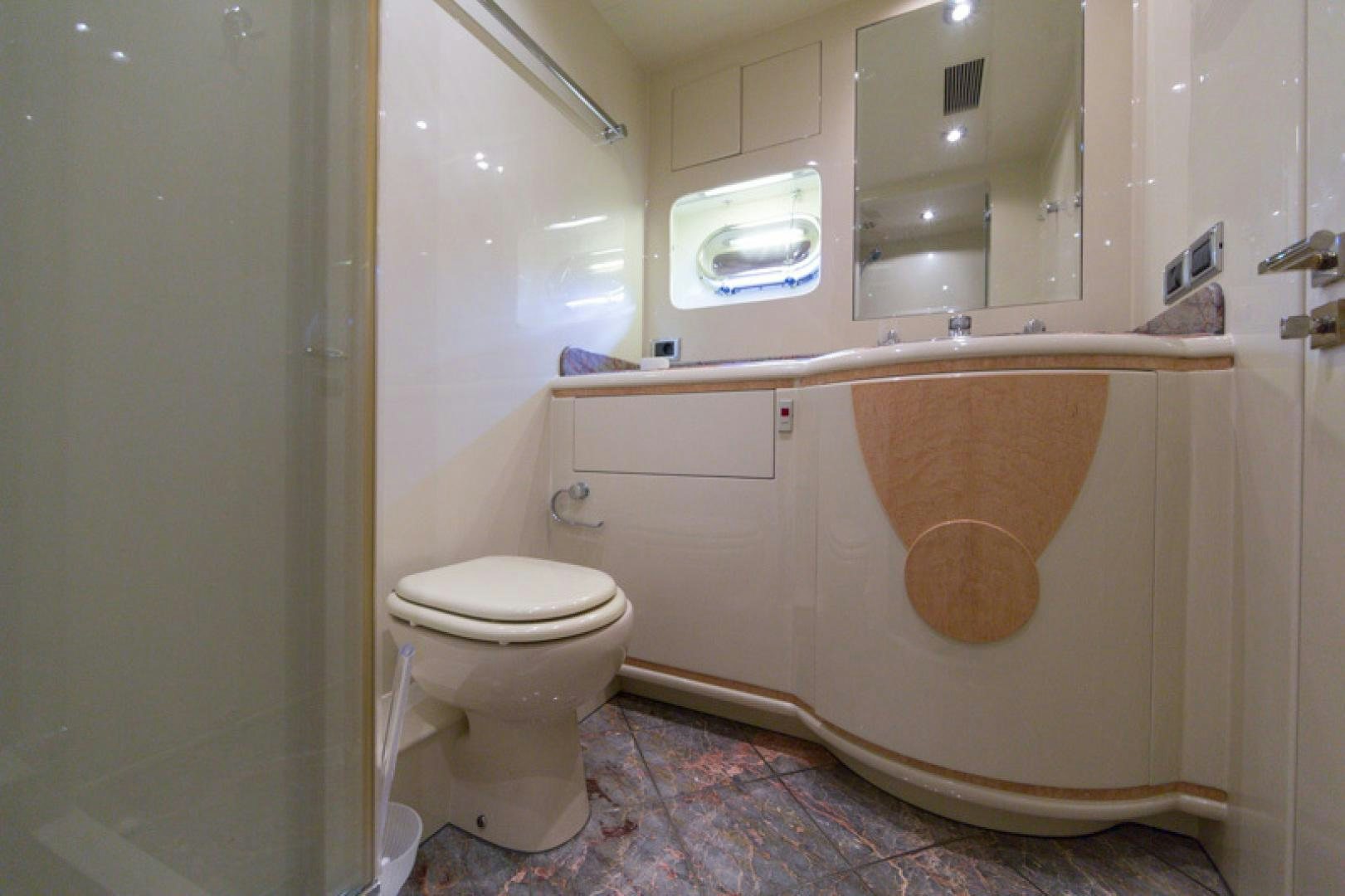 a bathroom with a bathtub and toilet aboard MR. CAT Yacht for Sale