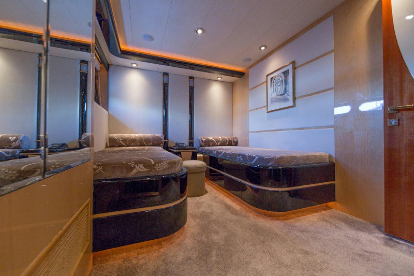 a room with a couch and a bed aboard MR. CAT Yacht for Sale