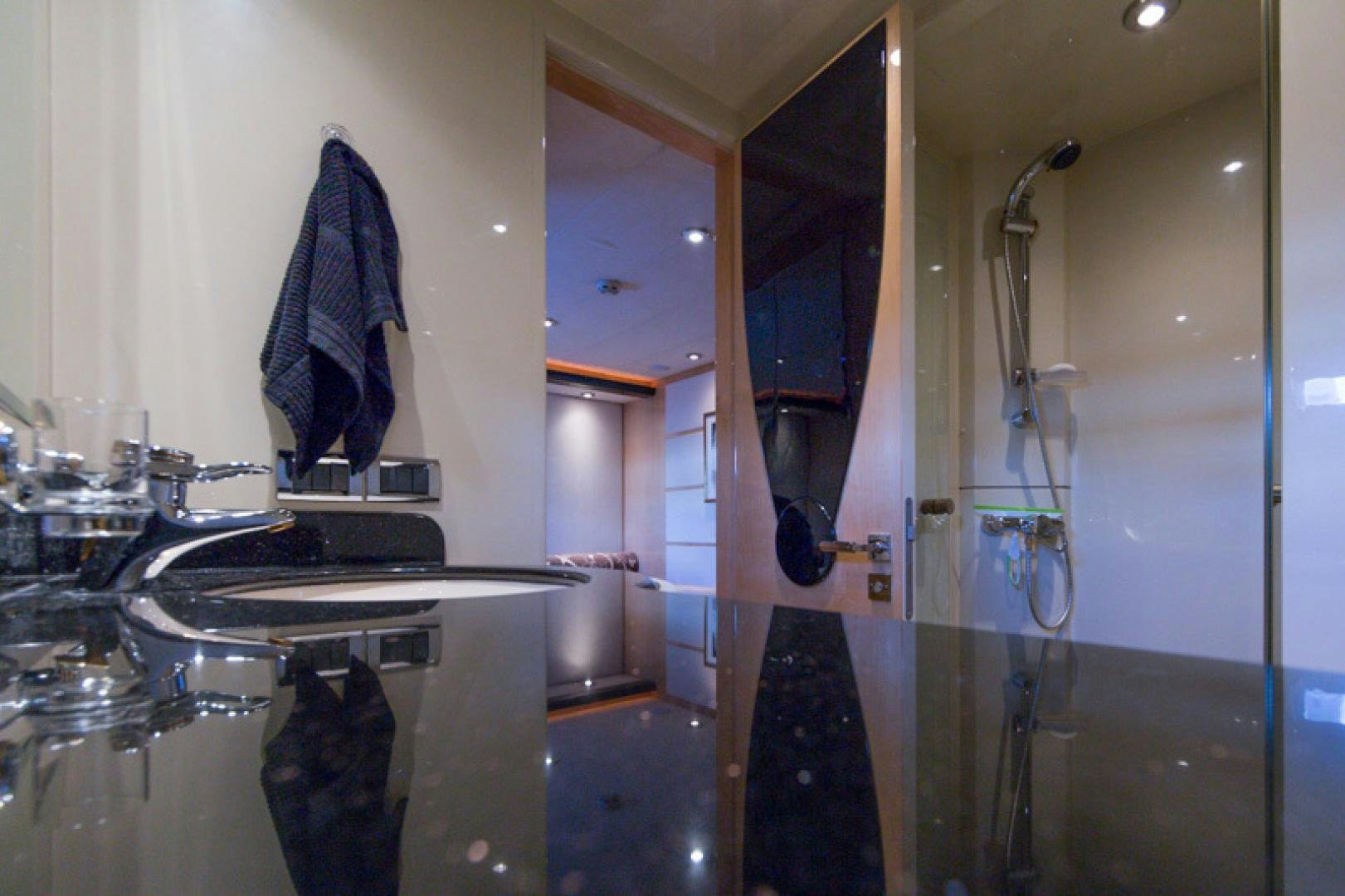 a bathroom with a sink and a shower aboard MR. CAT Yacht for Sale