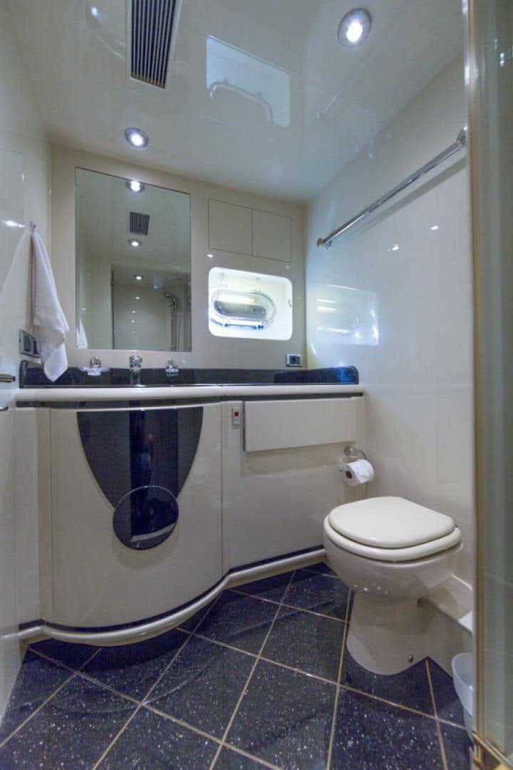 a bathroom with a sink and a toilet aboard MR. CAT Yacht for Sale
