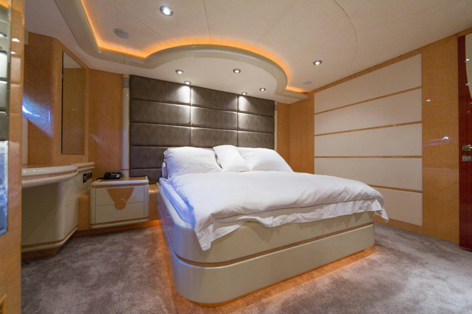 a room with a bed and a sink aboard MR. CAT Yacht for Sale