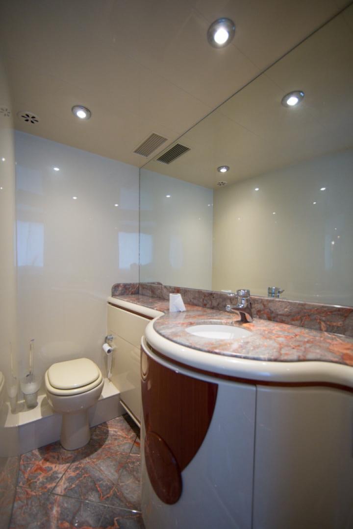 a bathroom with a sink and toilet aboard MR. CAT Yacht for Sale