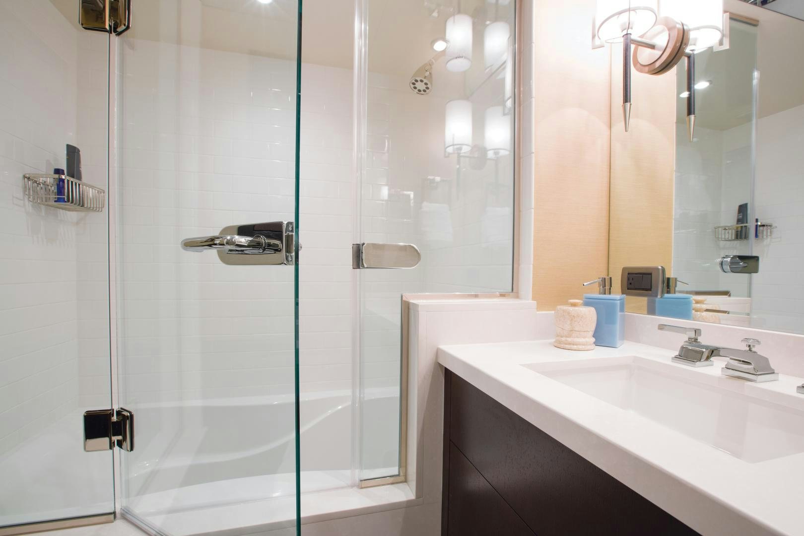 a bathroom with a shower and sink aboard 2021 HATTERAS 105RPH Yacht for Sale