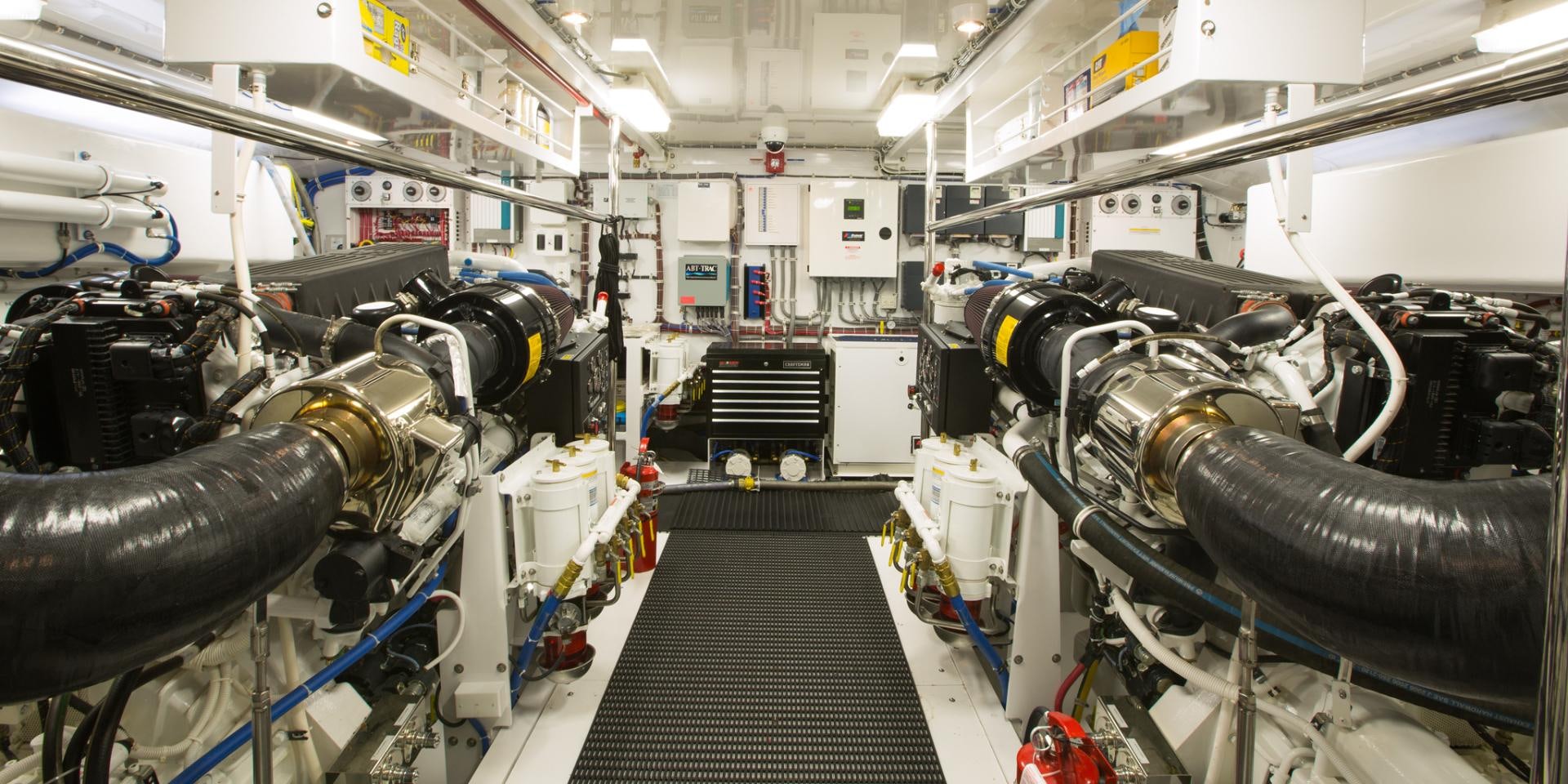 a room with machinery aboard 2021 HATTERAS 105RPH Yacht for Sale