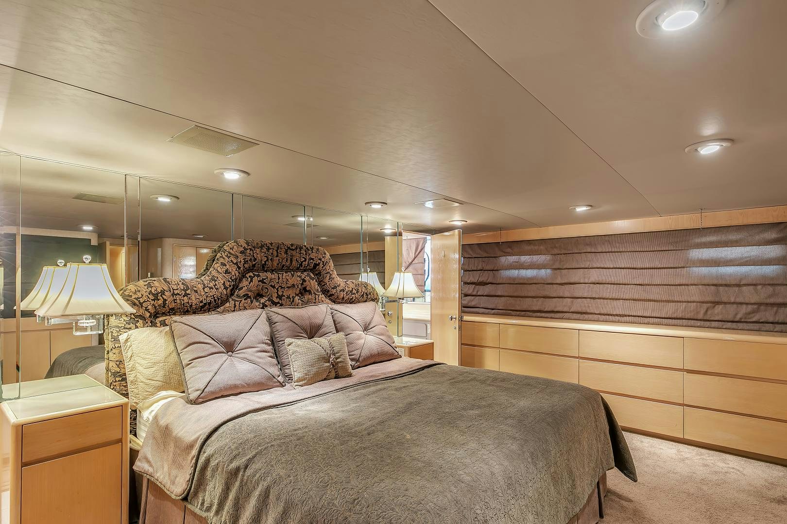 a bed in a room aboard LA VIDA Yacht for Sale
