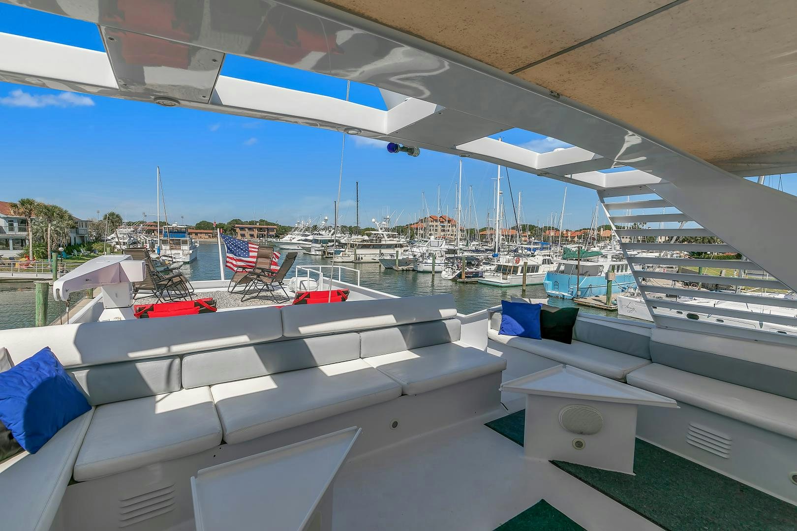 a view of a marina with boats and buildings aboard LA VIDA Yacht for Sale