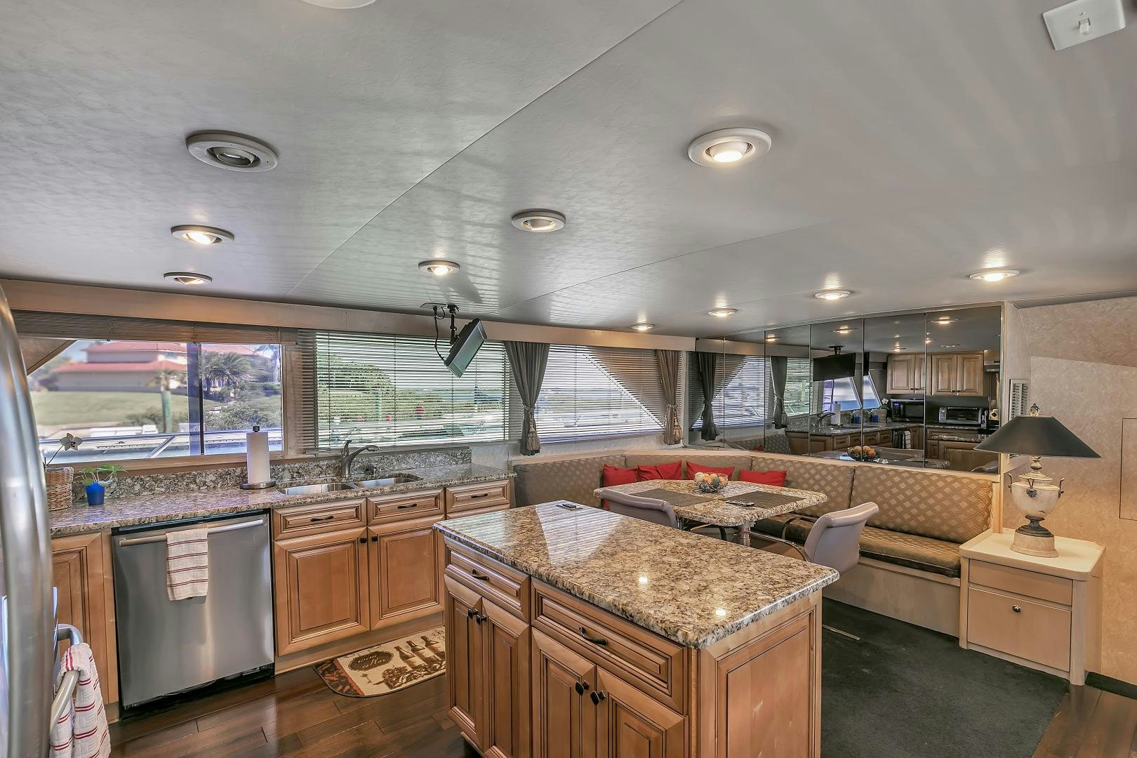 a kitchen with a large island aboard LA VIDA Yacht for Sale