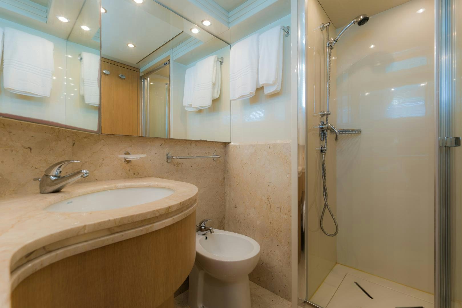 a bathroom with a sink and a toilet aboard AVELINE Yacht for Sale