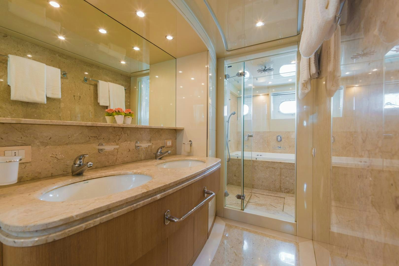 a bathroom with a sink and a shower aboard AVELINE Yacht for Sale