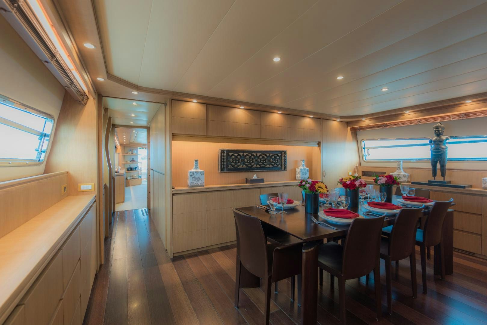 a kitchen with a table and chairs aboard AVELINE Yacht for Sale