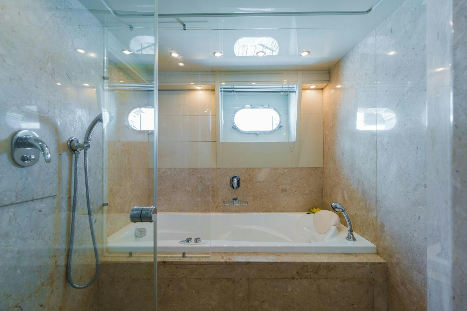 a bathroom with a bathtub aboard AVELINE Yacht for Sale