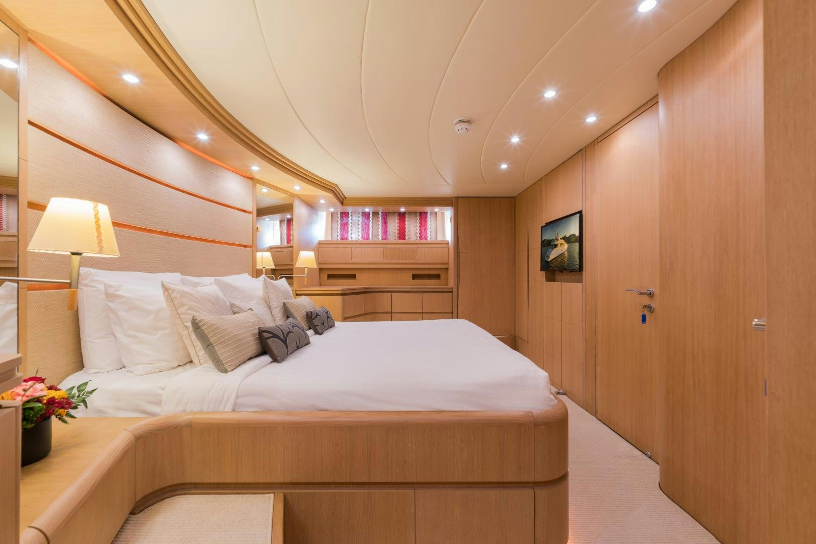 a bed with white sheets aboard AVELINE Yacht for Sale