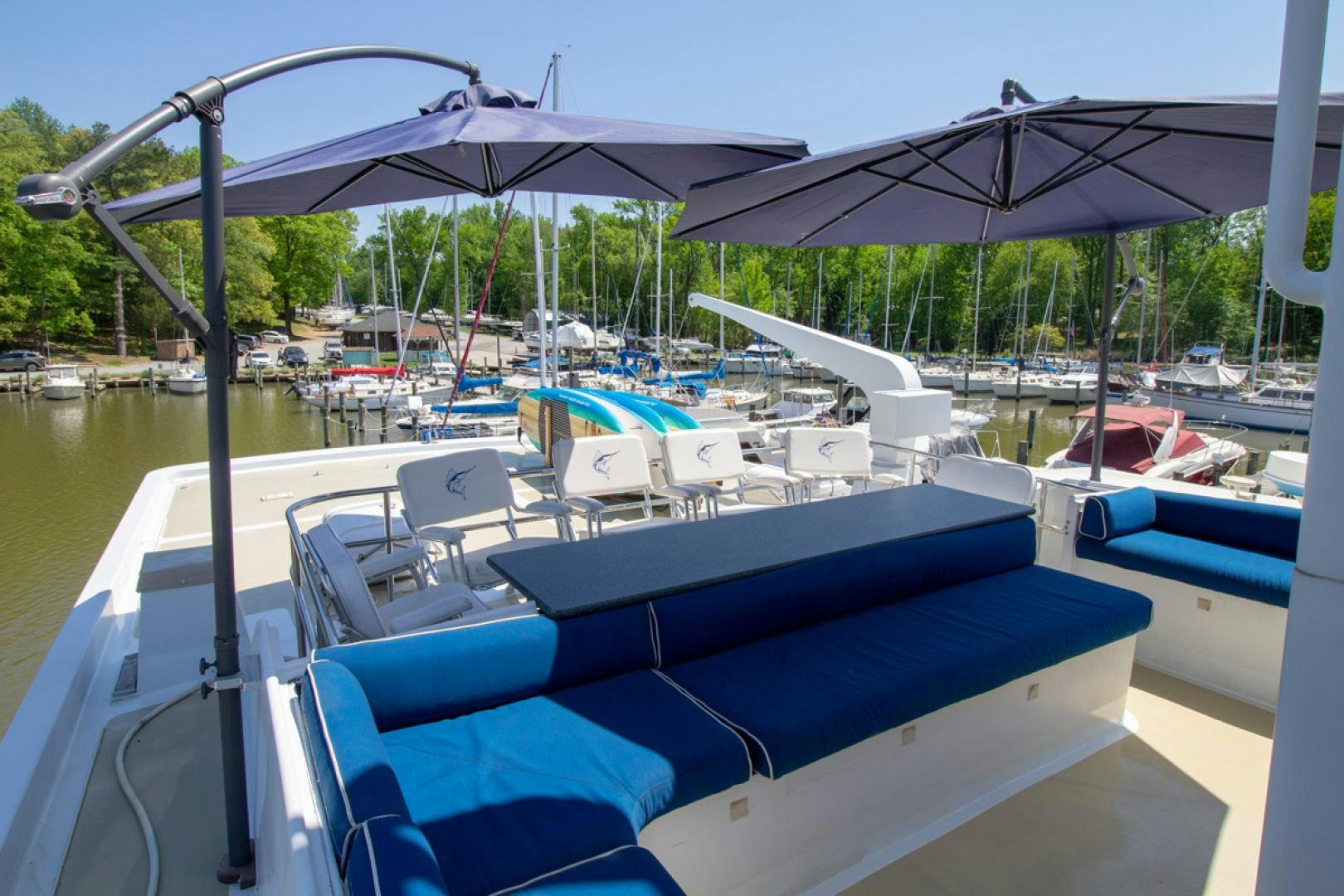 a boat is parked in the water aboard LIQUIDITY Yacht for Sale