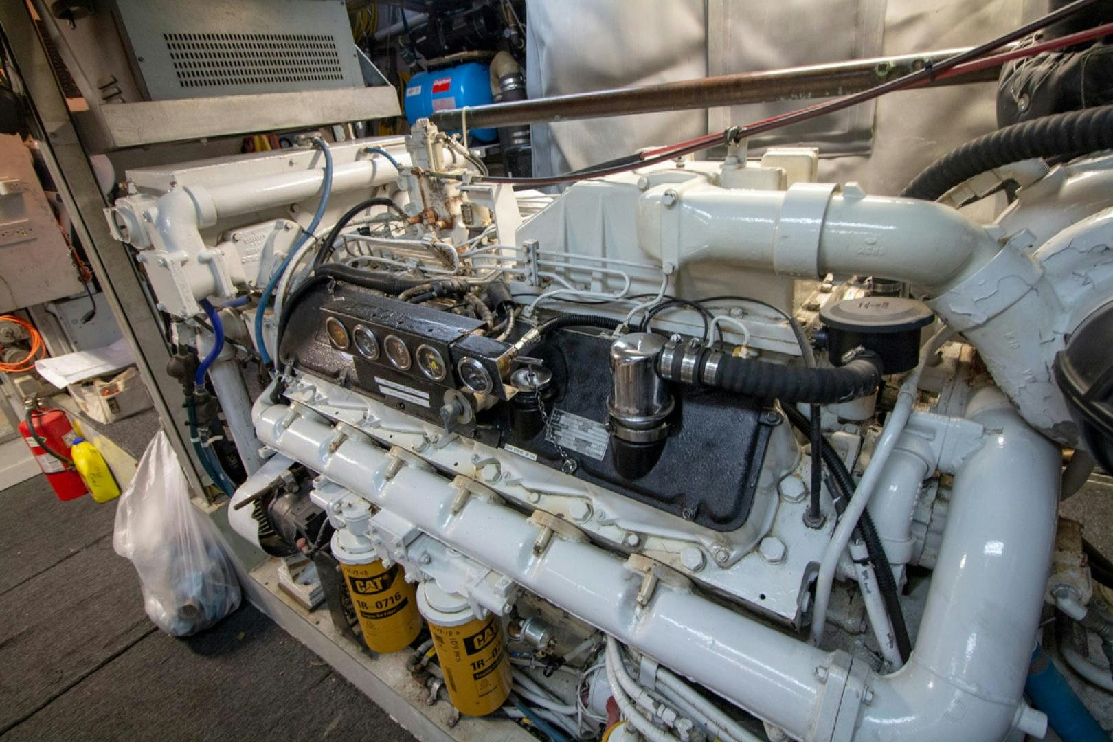 a machine with a large metal pipe aboard LIQUIDITY Yacht for Sale