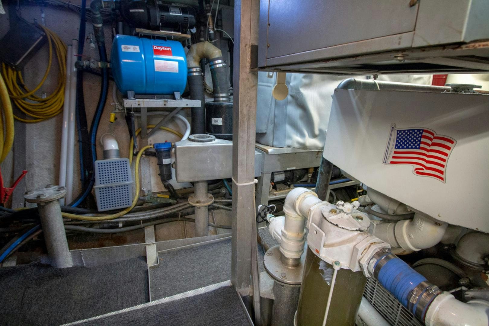 a white object with a flag on it aboard LIQUIDITY Yacht for Sale