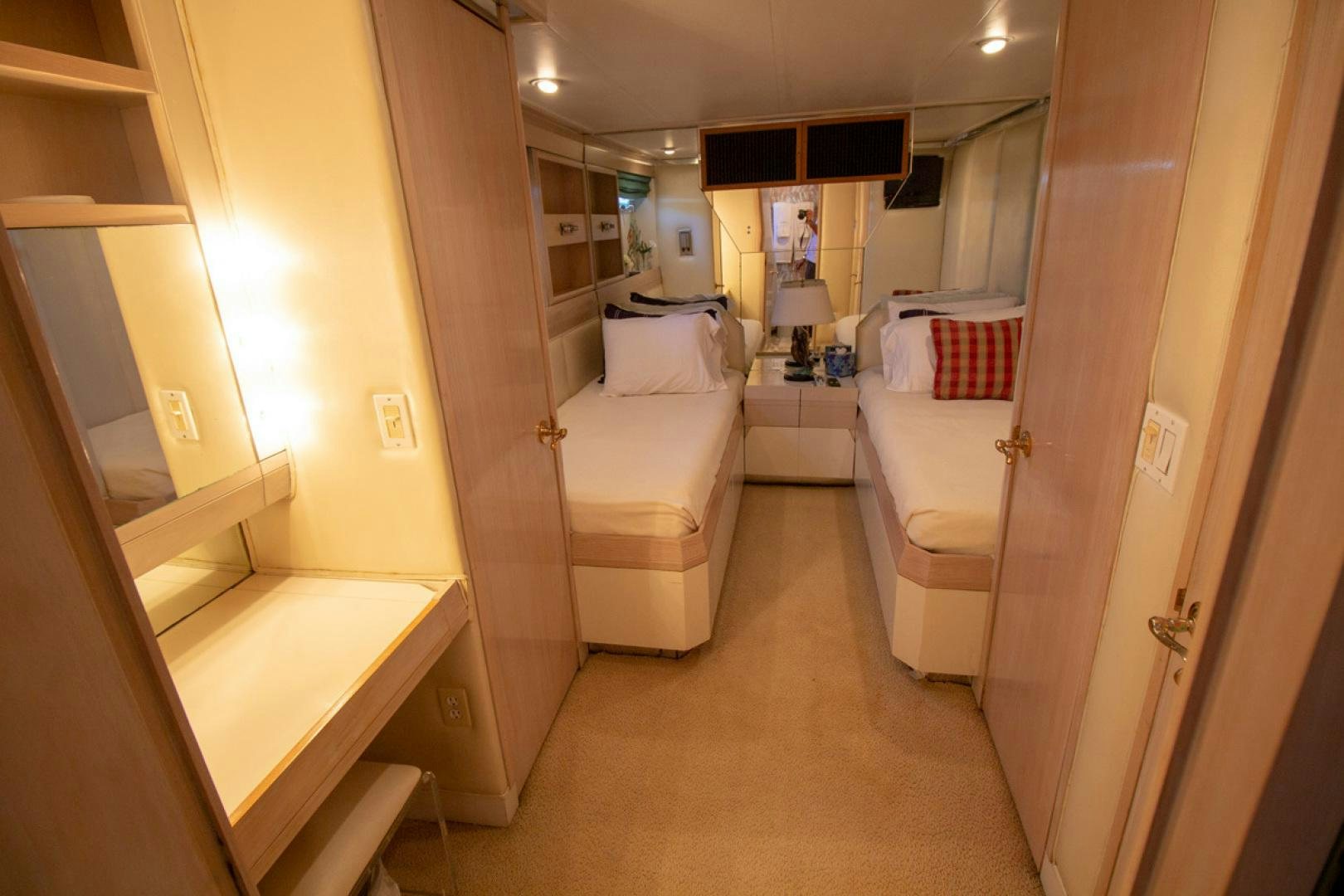 a bathroom with a tub sink and a mirror aboard LIQUIDITY Yacht for Sale