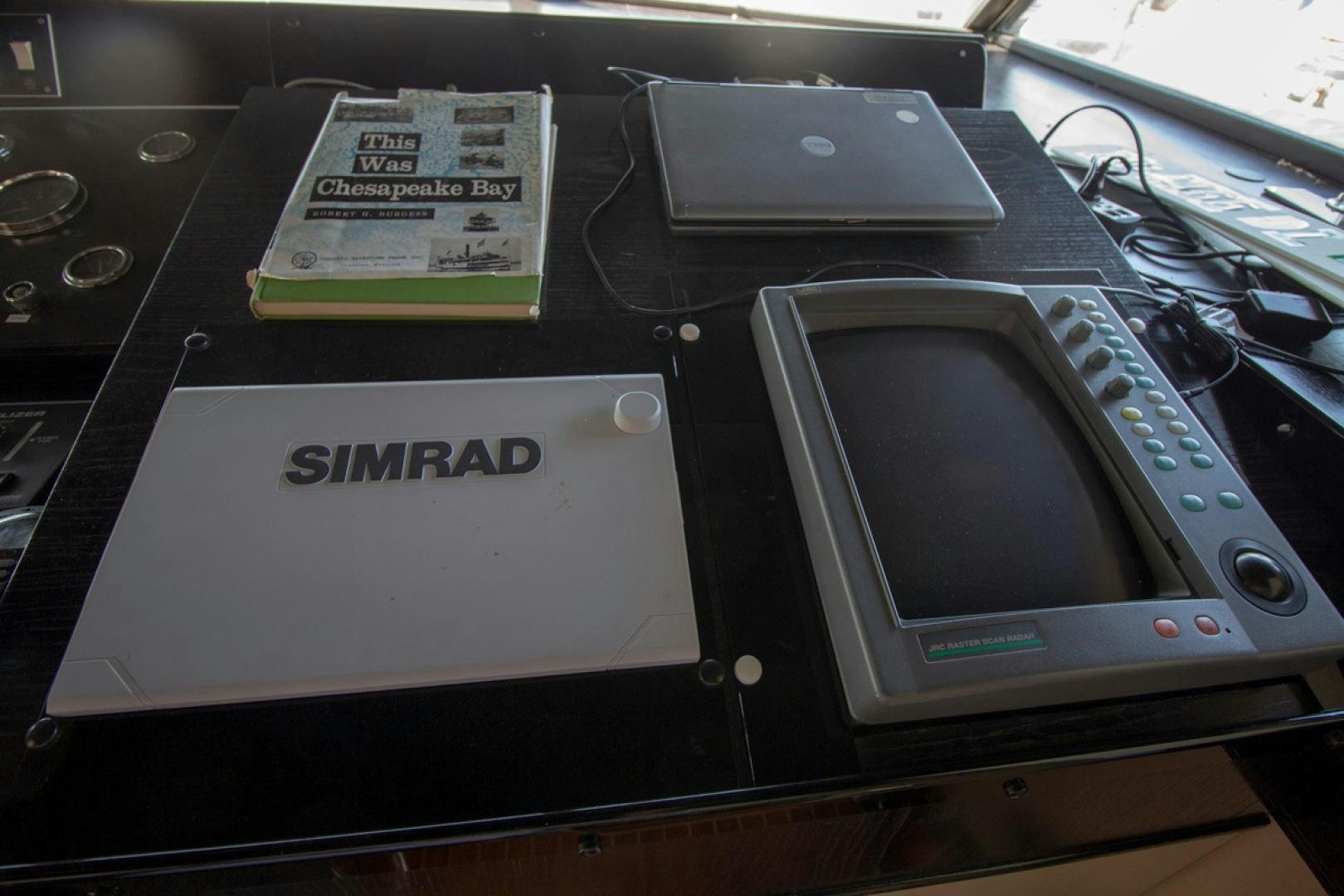 a group of electronic devices aboard LIQUIDITY Yacht for Sale