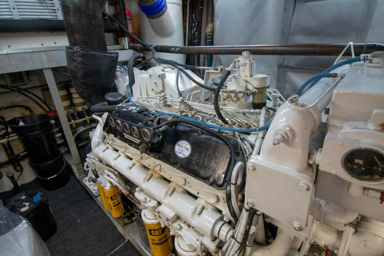 a machine with a large metal cylinder aboard LIQUIDITY Yacht for Sale