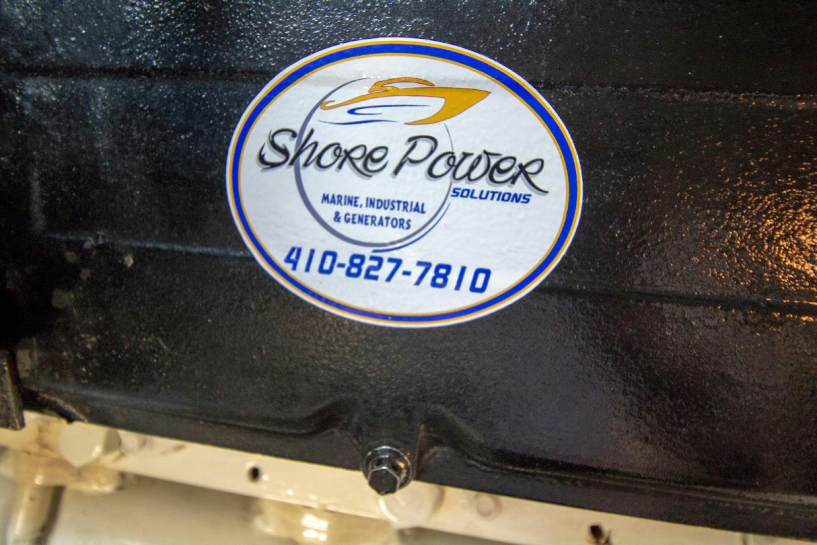 a logo on a metal surface aboard LIQUIDITY Yacht for Sale