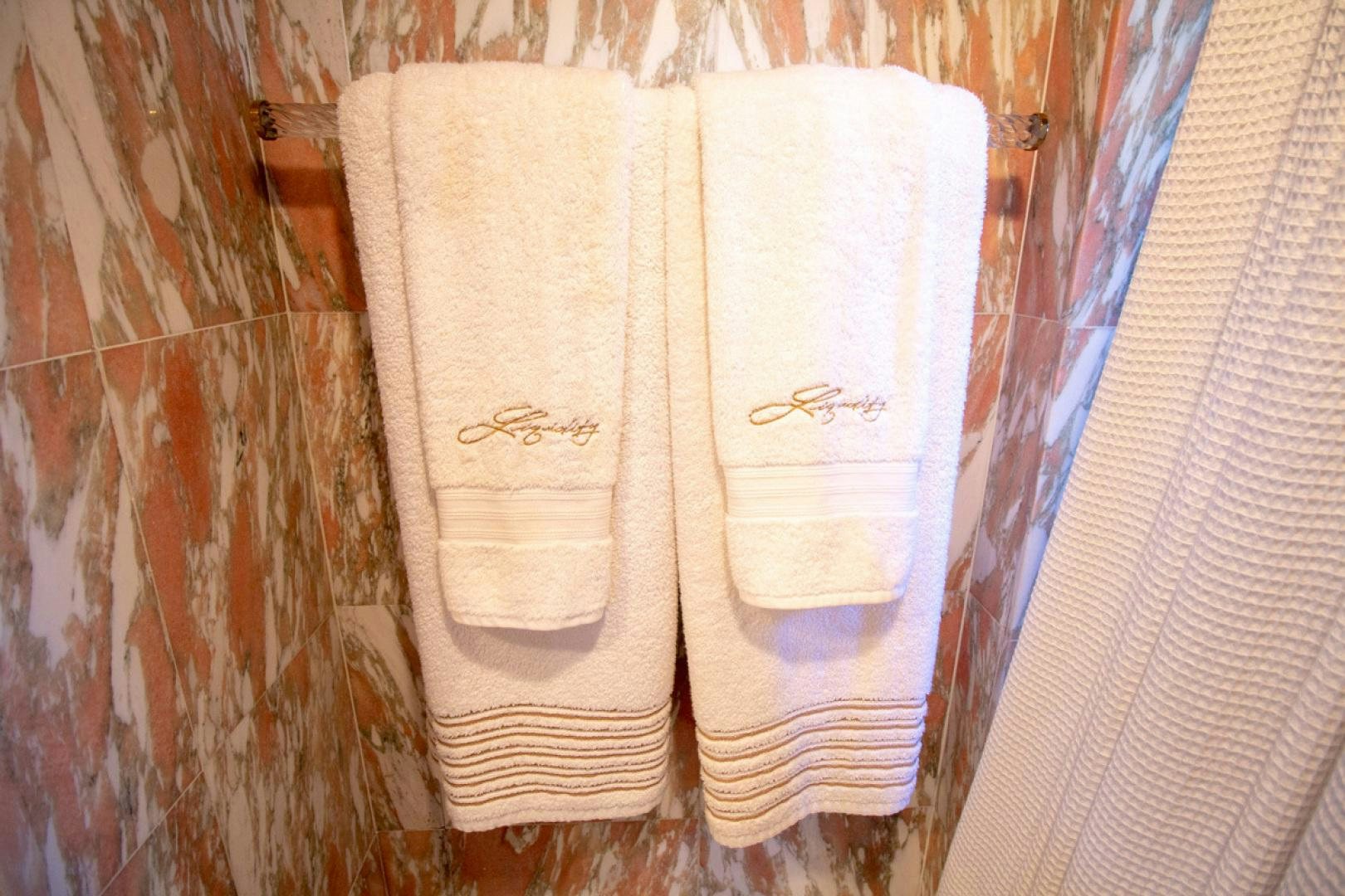 a pair of underwear on a bed aboard LIQUIDITY Yacht for Sale