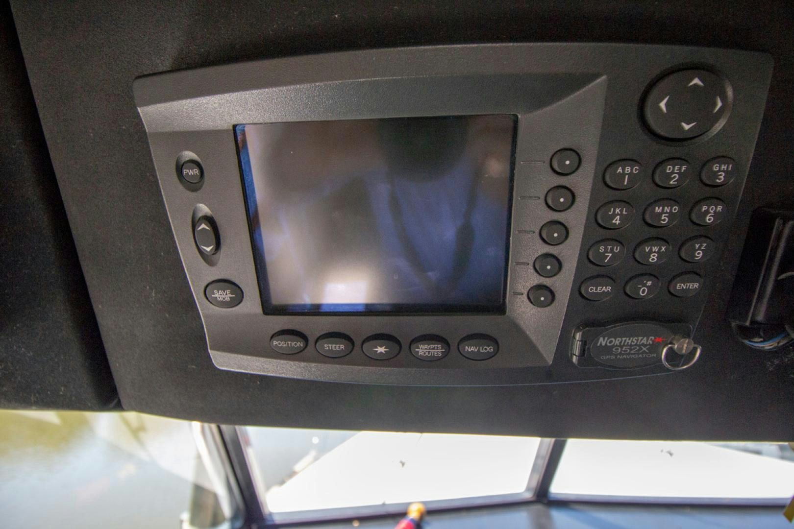 a close-up of a radio aboard LIQUIDITY Yacht for Sale