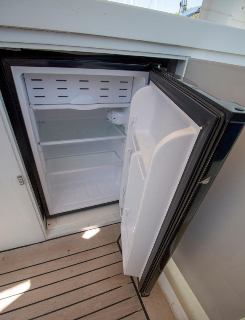 an open oven with a door open aboard LIQUIDITY Yacht for Sale